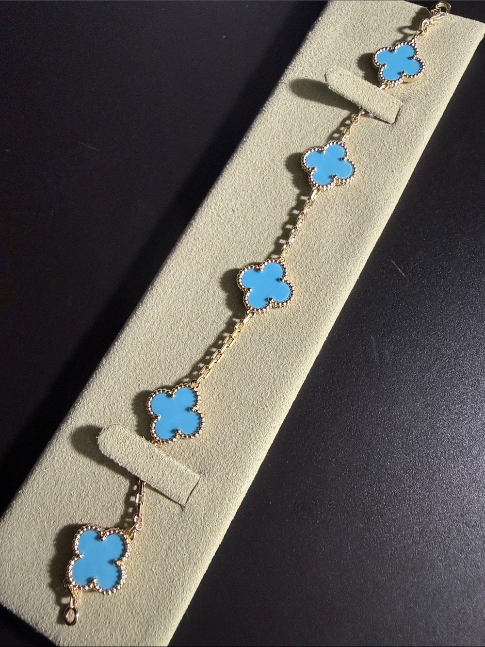 Gold Bracelet with Bright Turquoise Clover Motifs
